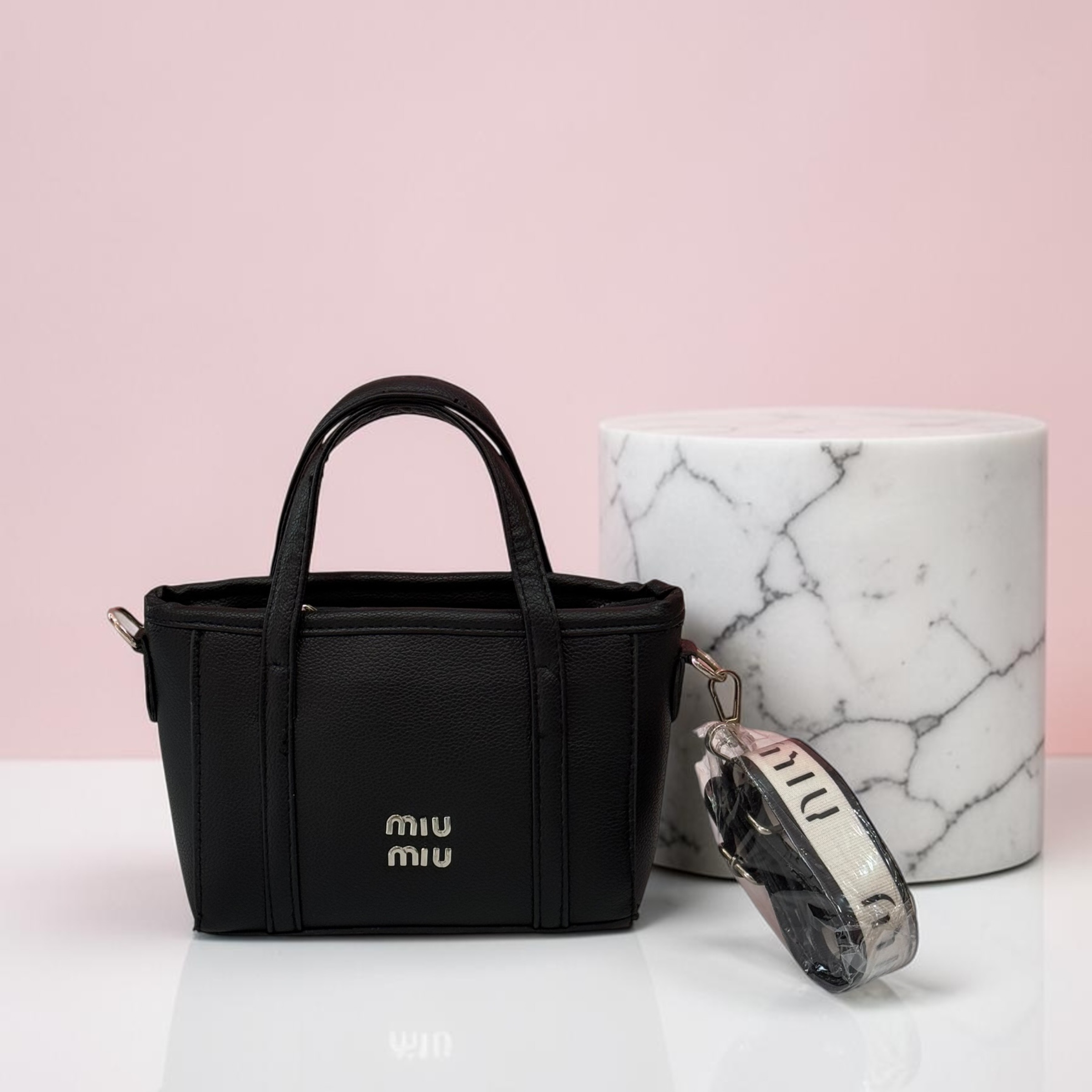 کیف زنانه چرمی مشکی MIU MIU با کیف گرد همراه – کد 281