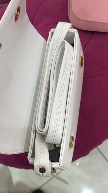 کیف دستی زنانه چرمی صورتی با لوگوی طلایی مدل ۳۸۳