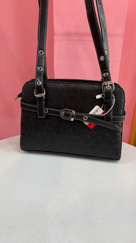 کیف زنانه چرمی – مدل Coach قهوهای (کد ۶۰۵)