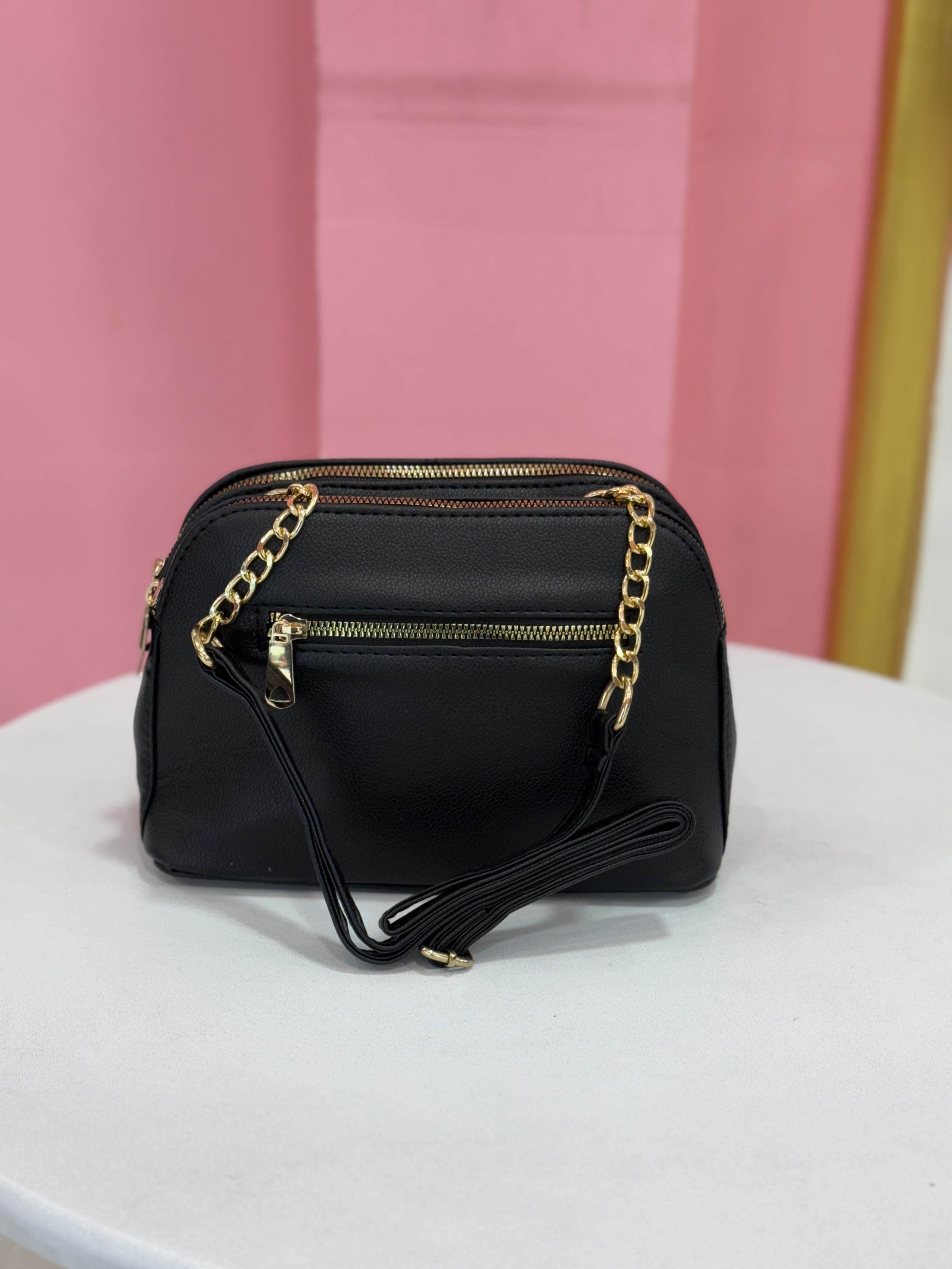 کیف زنانه چرمی مشکی برند Charles & Keith با طراحی دو زیپ طلایی کد ۷۱۴